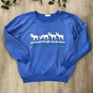 Vintage Blue Sweatshirt with White Wildlife Motif